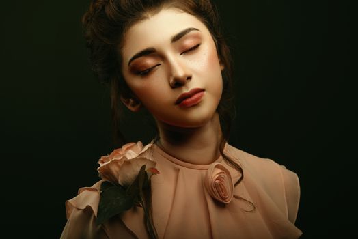 Portrait of an elegant woman with eyes closed, wearing a rose, Ciudad de Guatemala.