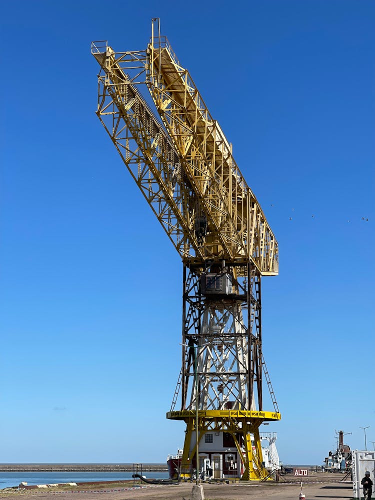 Yellow Crane In A Cargo Port Pier