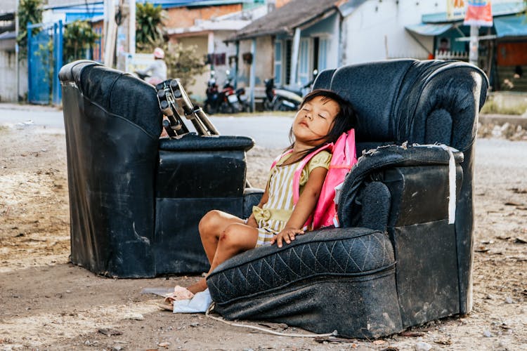 Girl Sleeping On Sofa