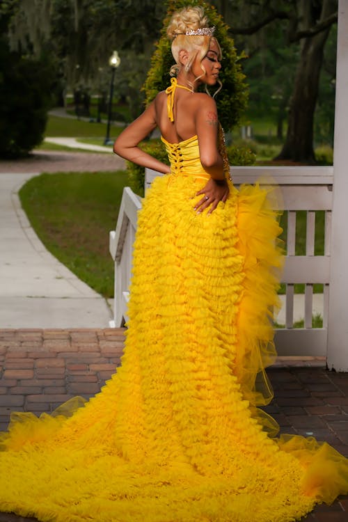 Young Woman in a Yellow Prom Dress 