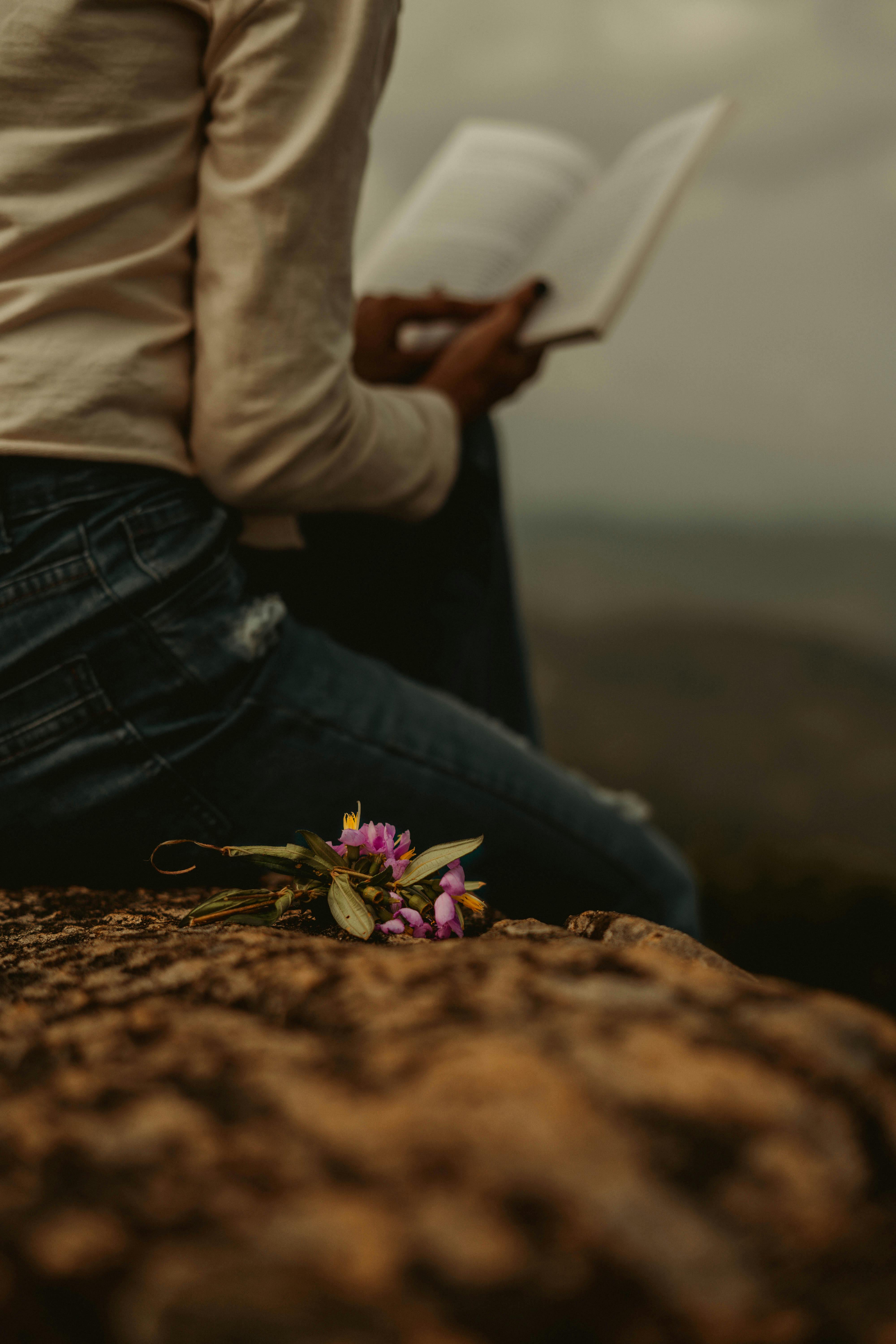 girl with book in rock