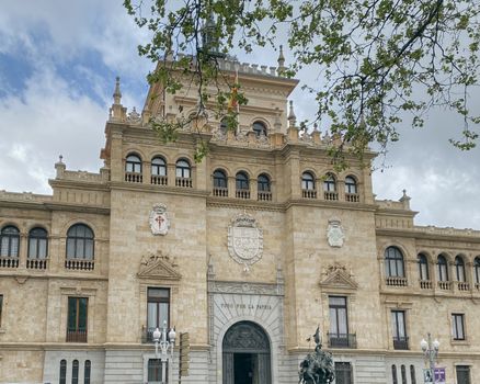 Historic façade of a Baroque building in Valladolid, Spain, showcasing intricate architectural details.