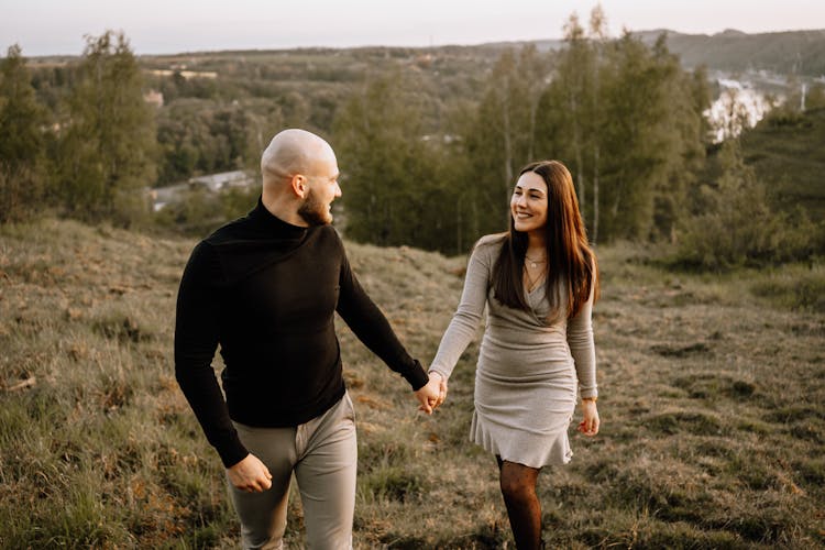 Woman And Man Holding Hands