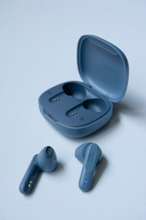 Close up of Wireless Earphones and Case
