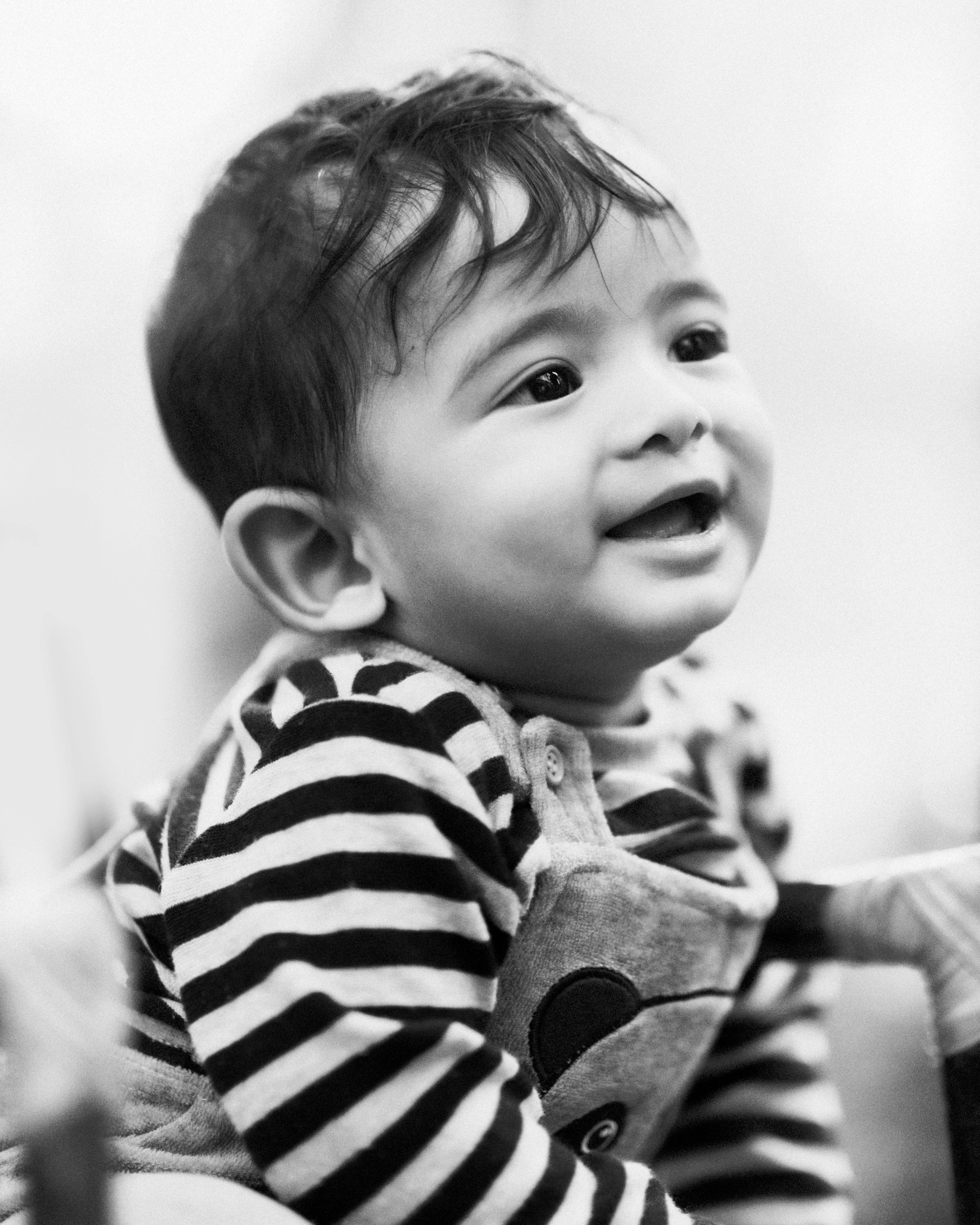 cute baby smiling black and white