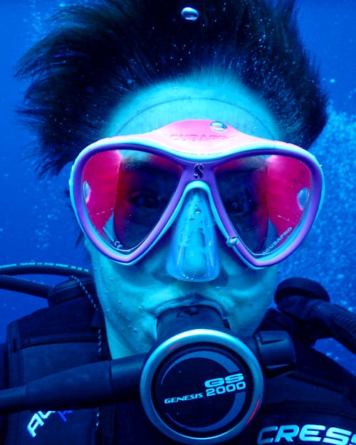 Person Wearing Goggles Underwater