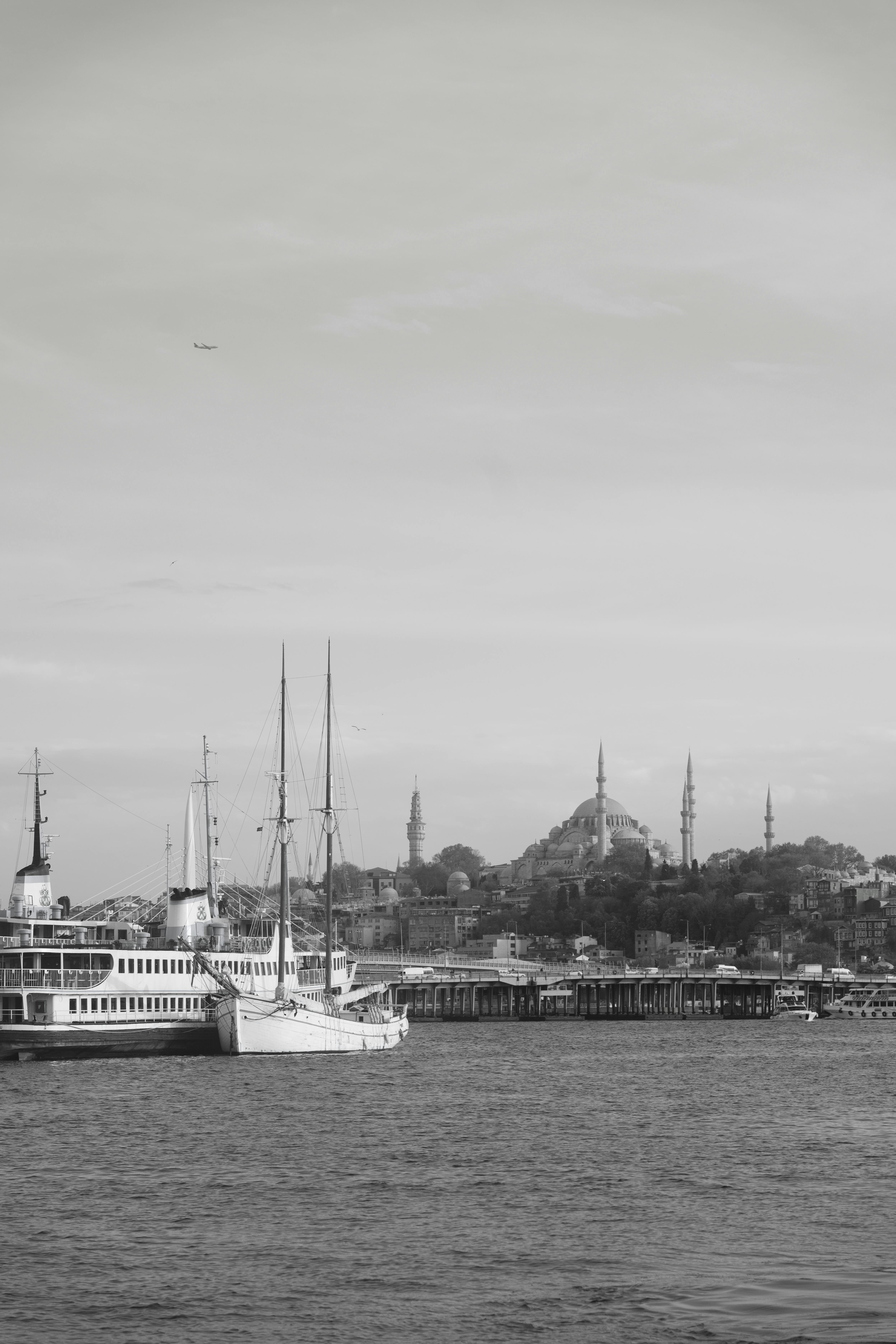 Black and white view of Istanbul with Hagia Sophia and the Bosphorus, showcasing urban and historical architecture.