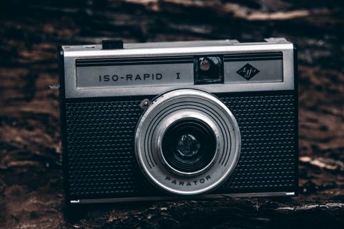 Free Close-up of a classic Agfa ISO-Rapid I vintage film camera on rustic background. Stock Photo
