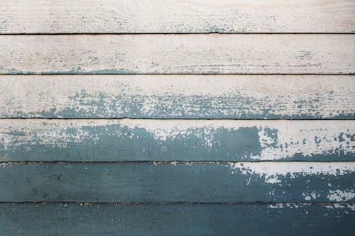 бесплатная Серая деревянная стена с бежевой краской Стоковое фото