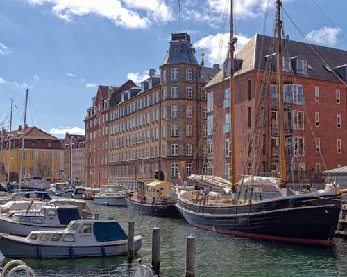 Motorboats and Ships Moored in City