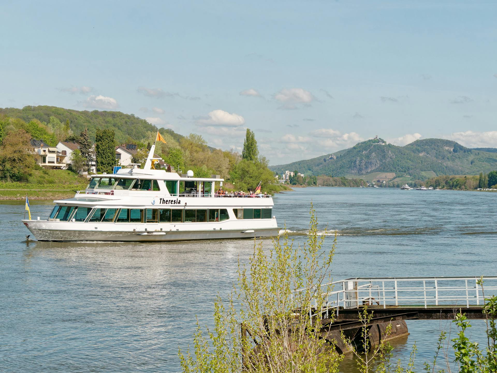 A Passenger Ship Sailing on the River