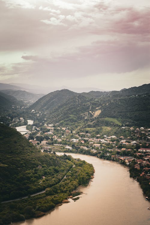 Aerial View of the River Aragvi and City of Mtskheta in a Valley 