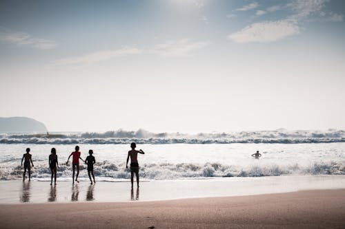 Free Five Child Playing in the Beach Stock Photo