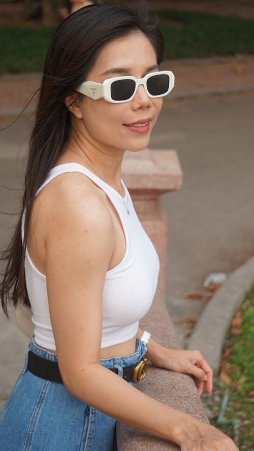 Photo of a Woman Wearing Sunglasses