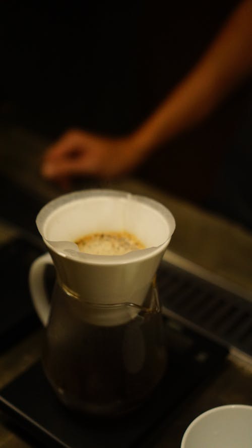 Close-up of a Glass Coffee Pot with a Coffee Filter 