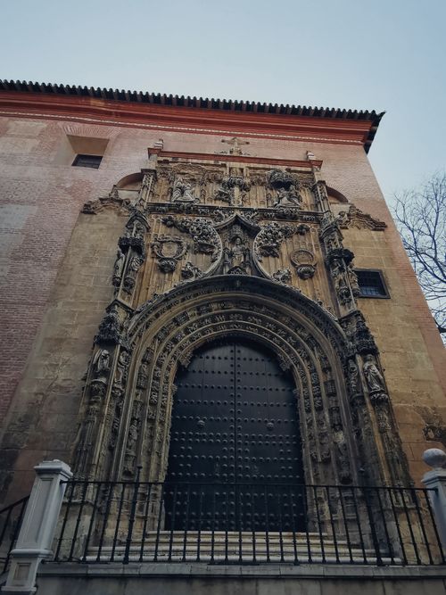 Free Low angle view of an intricately carved Gothic cathedral entrance, showcasing detailed ornamentation. Stock Photo