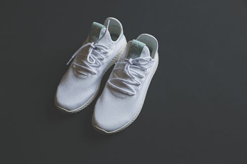 Free Pair Of White Running Shoes Stock Photo