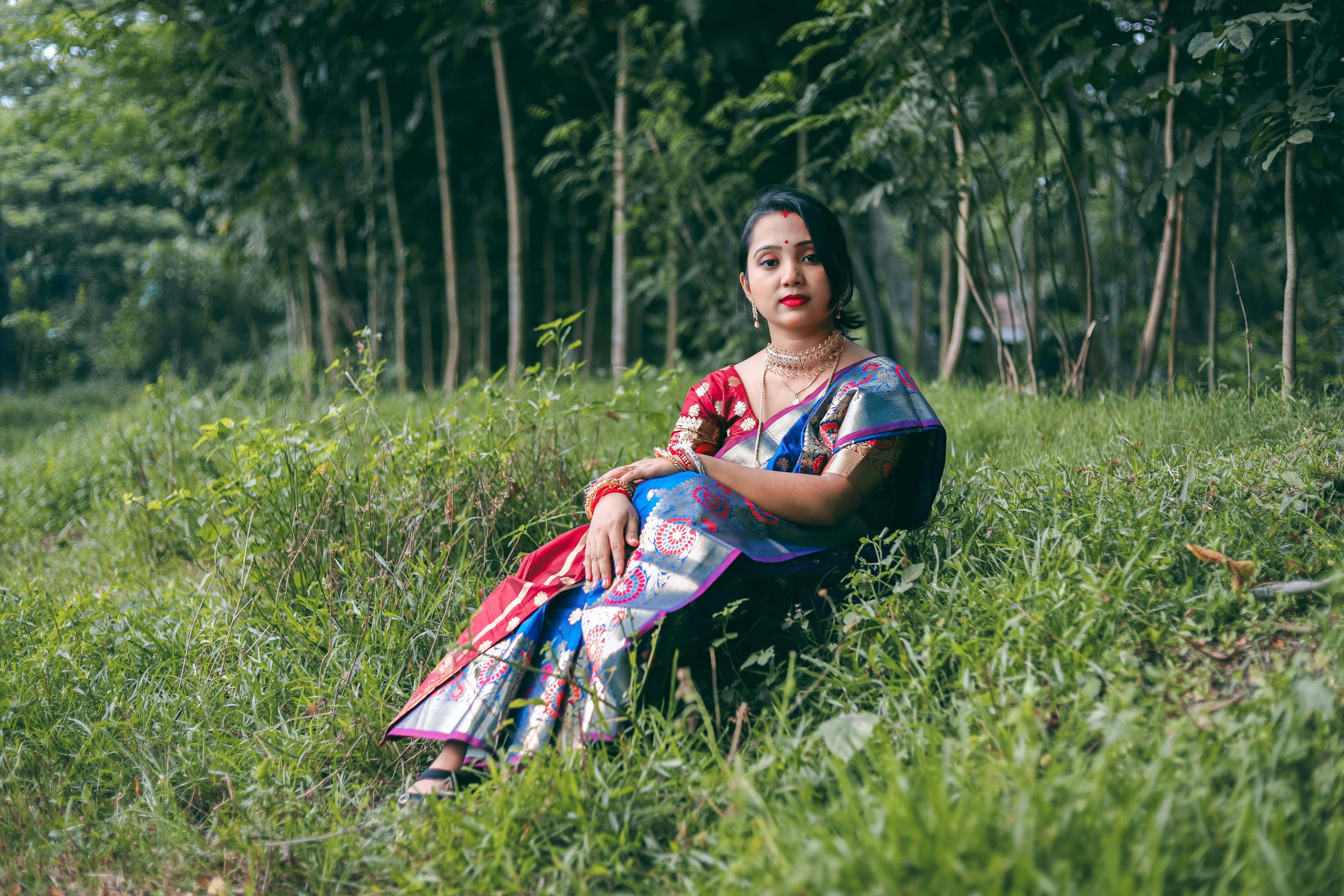 Beautiful Indian young girl in Traditional Saree posing outdoors 5579119  Stock Photo at Vecteezy