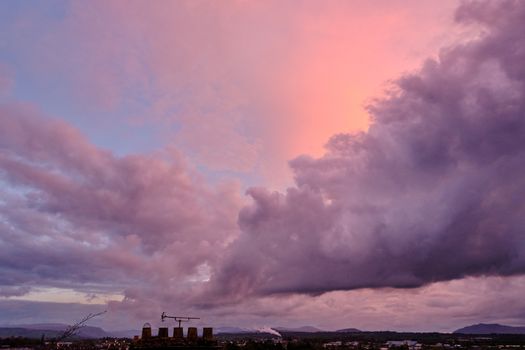 Cloudy Sky Over the Town at Sunset
