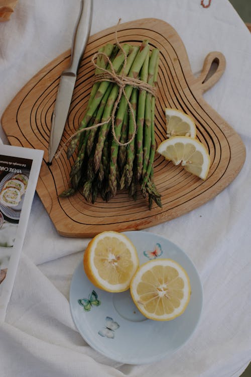 Asparagus Bundle Set on Wooden Cutting Board 