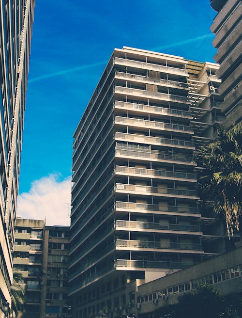 Apartment Buildings Under Blue Sky