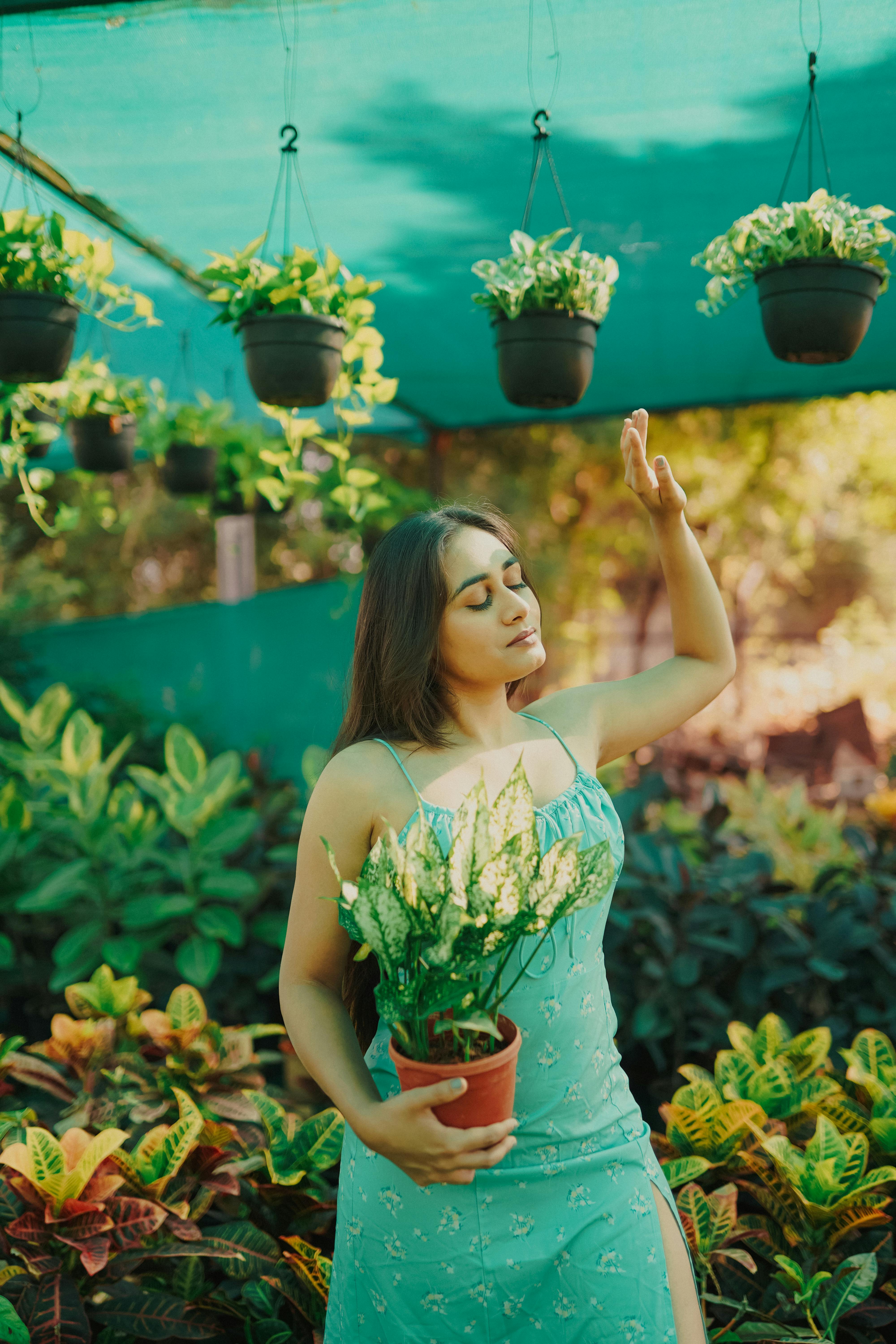 Ronit and Dhwani's pre-wedding photoshoot was packed with fun poses in a  boat, garden, a quirky library, and more - WeddingSutra