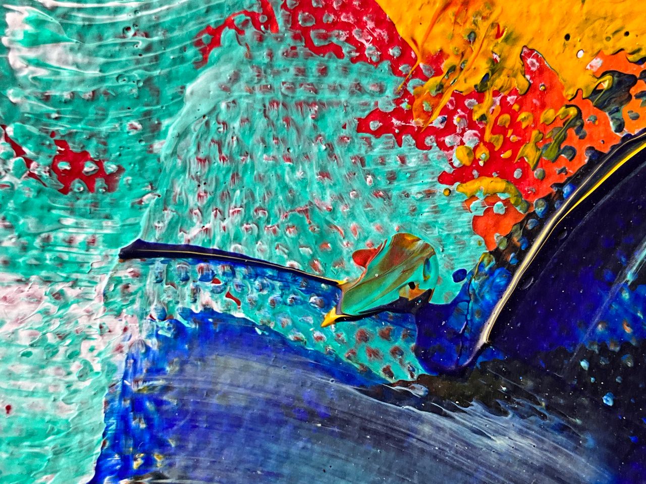 colorful abstract artwork featuring vibrant paint strokes and textures