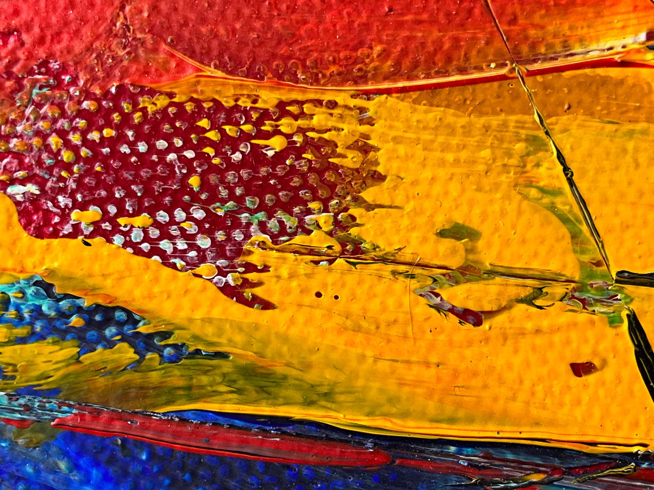 close up of vibrant colorful abstract painting with rich textures and