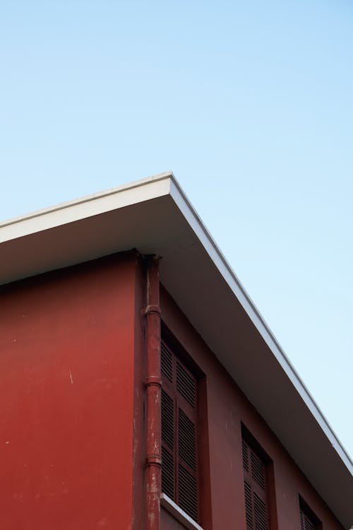 Бесплатное стоковое фото с вертикальный выстрел, водосточный желоб, дом