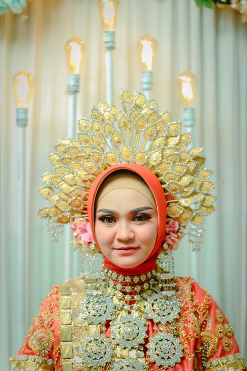 Bride in Ornate Indonesian Wedding Dress and Jewelry