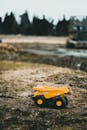 Photo of a Toy Dump Truck on the Ground