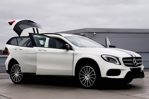 White Mercedes-Benz GLA with Opened Doors
