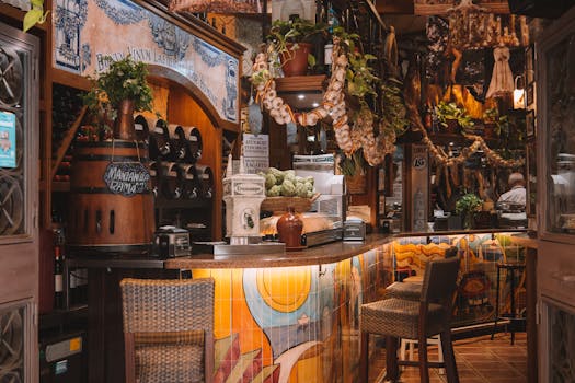 Warm and inviting bar in Málaga, Spain, featuring rustic decor and vibrant tiles.