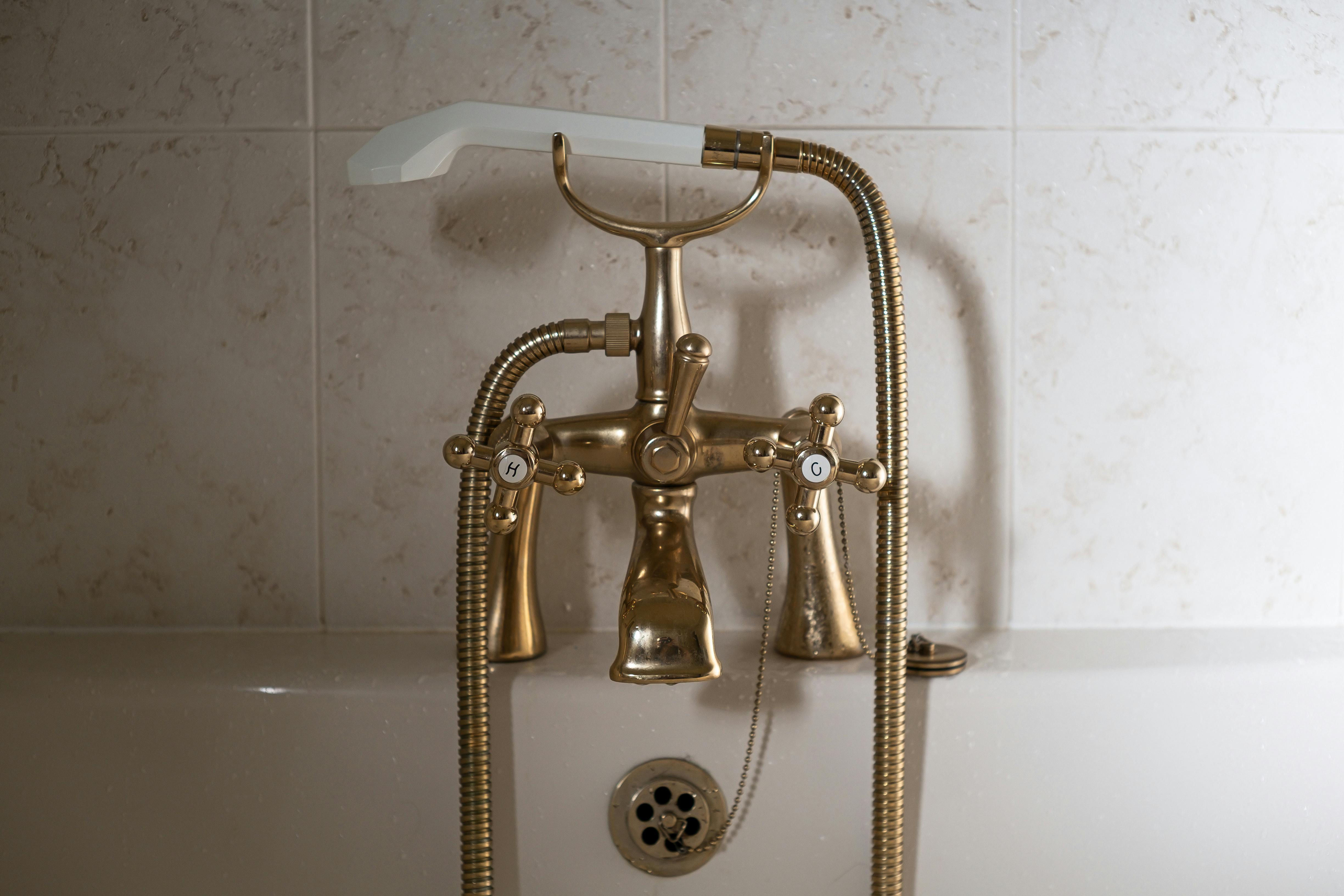 Close-up of Person Washing Hands under Faucet · Free Stock Photo