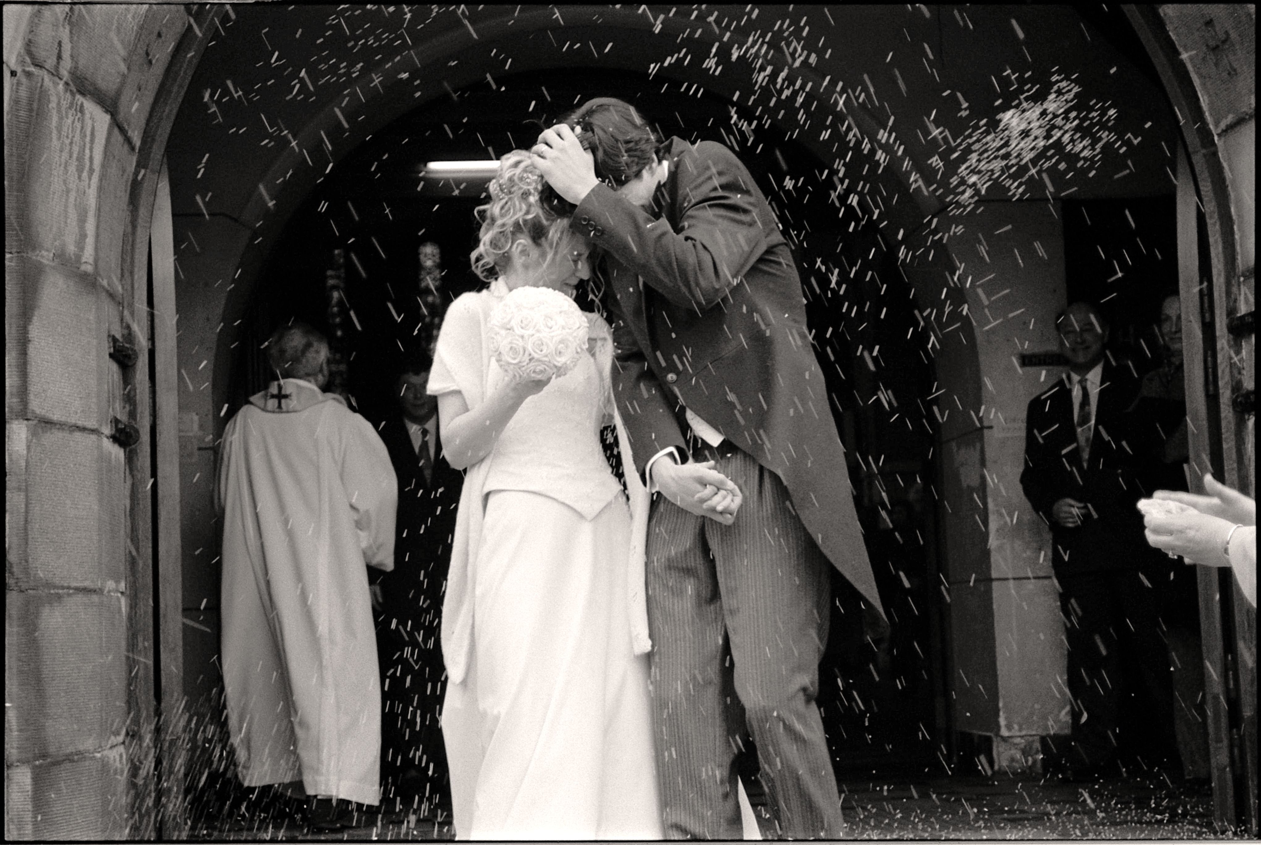 People Throwing Rice on the Newlyweds · Free Stock Photo