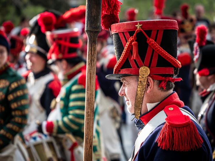 Soldiers Wearing Historical Uniforms For A Ceremony