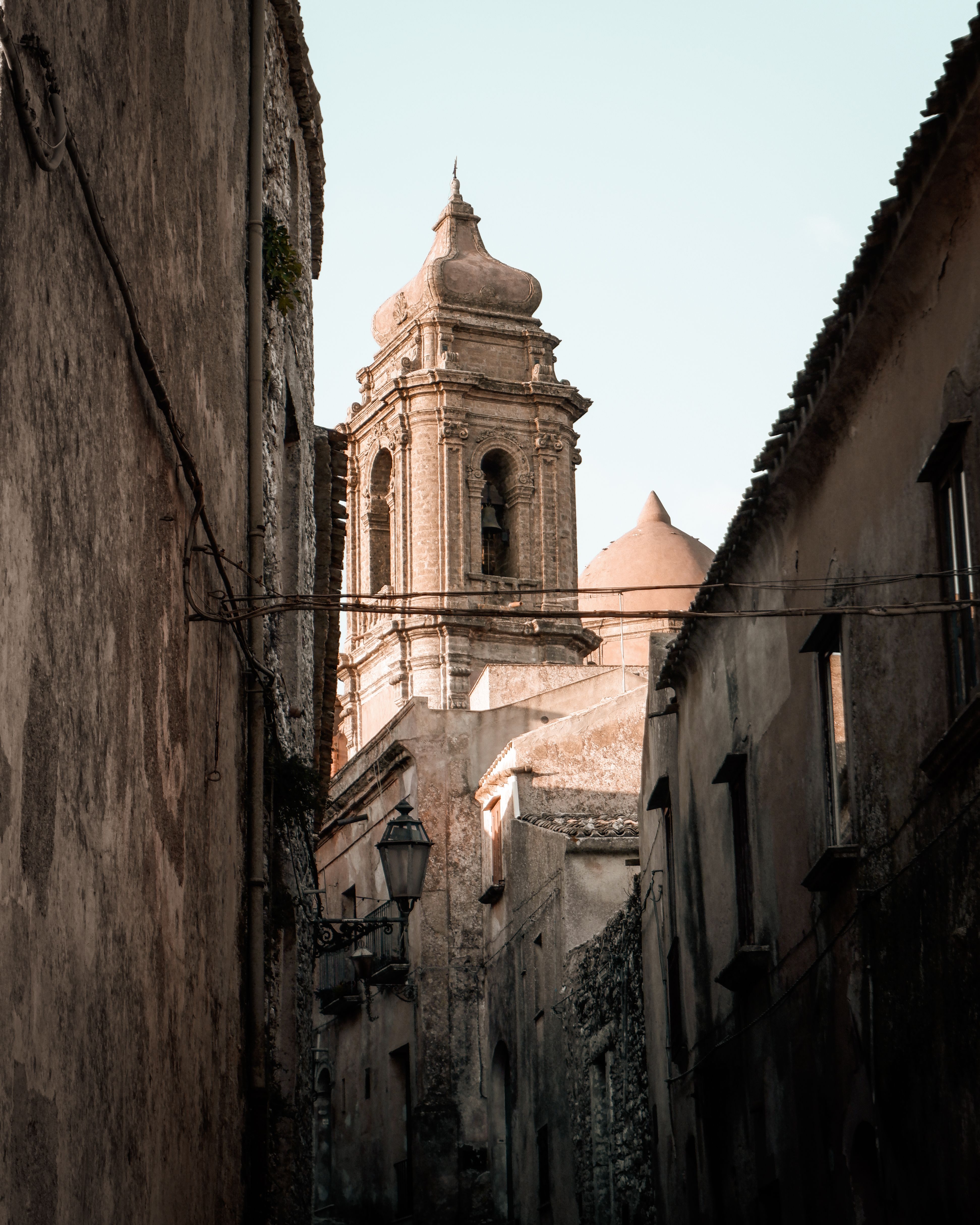 Discover the charm of Erice's streets with its medieval architecture and historic tower.