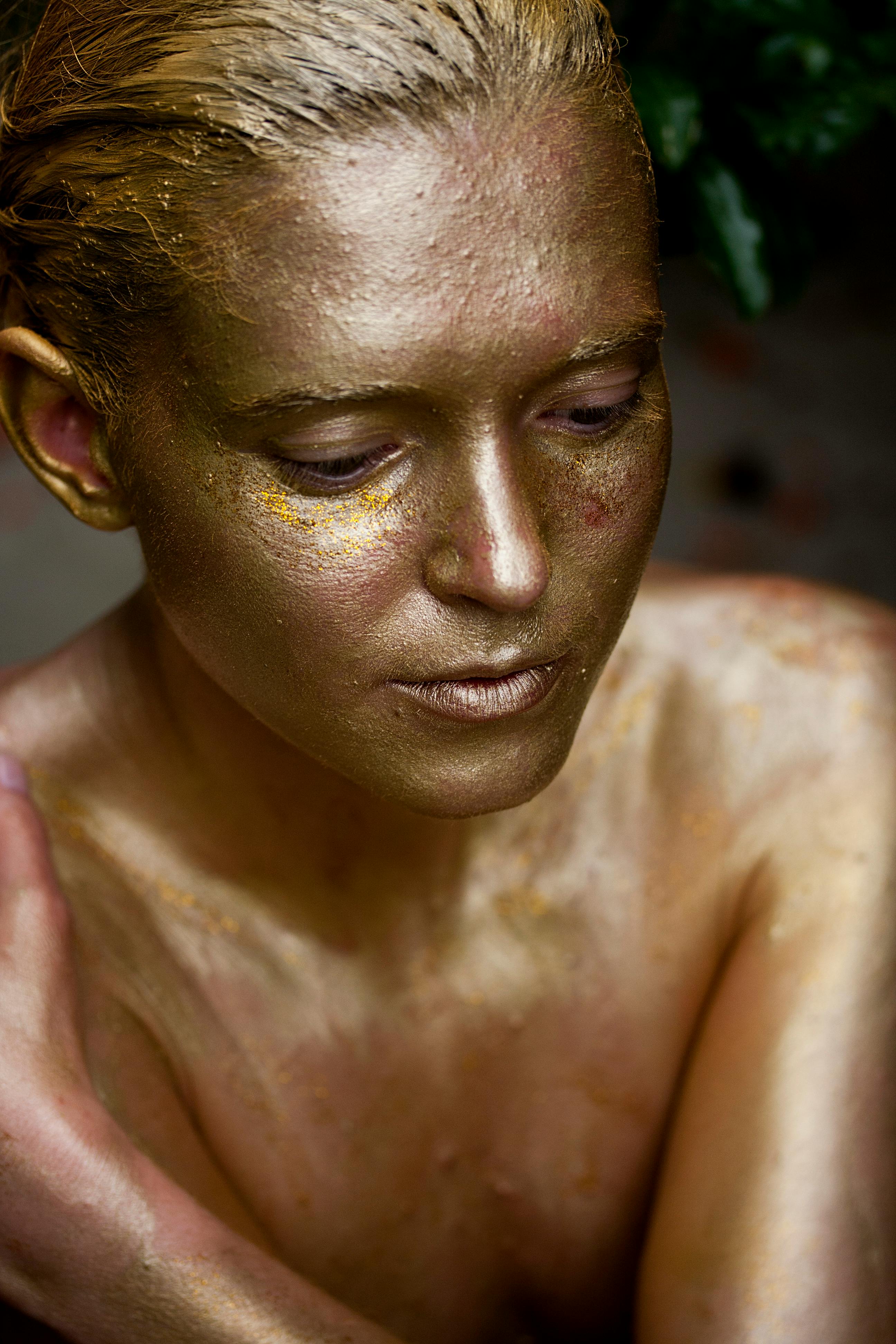 Woman Wearing Gold Body Paint
