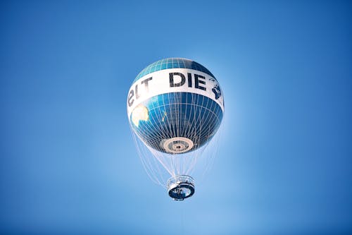Low Angle Shot of a Hot Air Balloon on the Background of a Blue Sky 