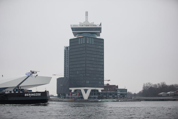 The Adam Tower Seen From The Canal In Amsterdam, Netherlands 