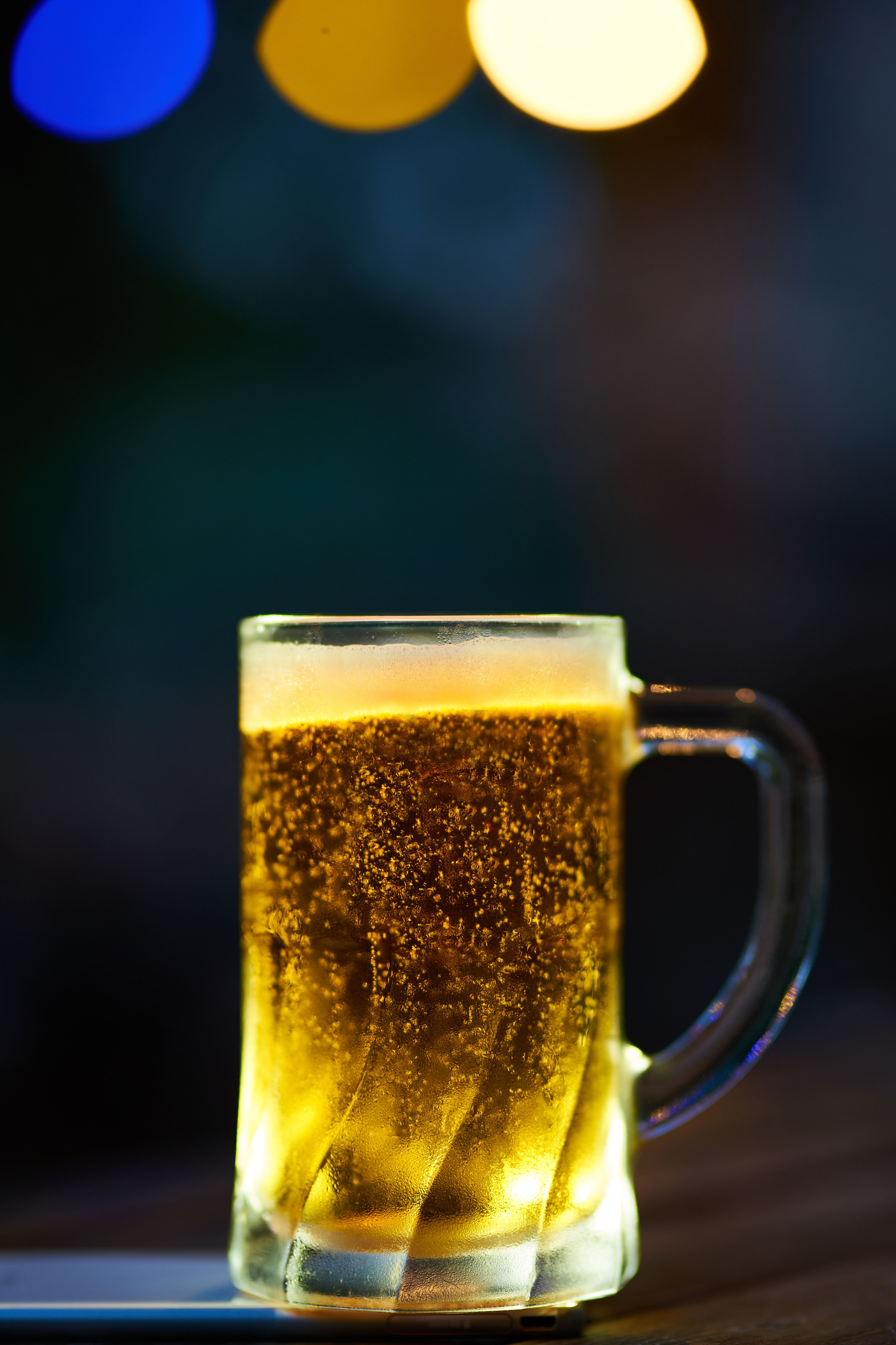 Amber pour under the taproom lights