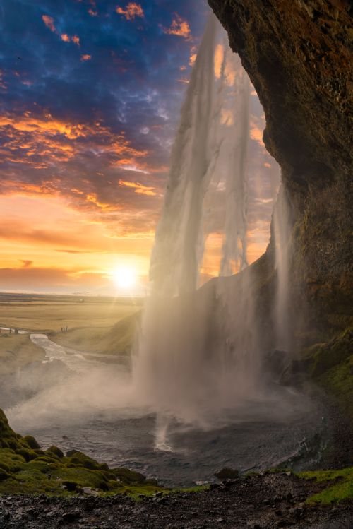 Free Seljalandsfoss is a treat for adventurers Stock Photo