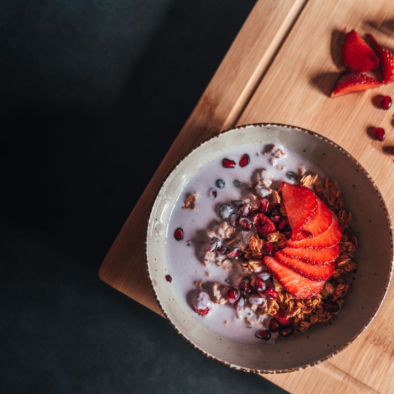 Pomegranate-Rosewater Yogurt with Pistachio and Cranberry Granola