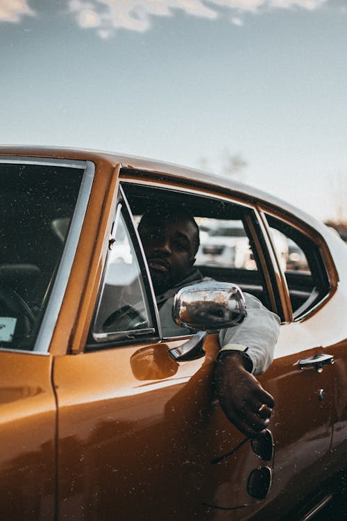 Man Sitting in a Car 