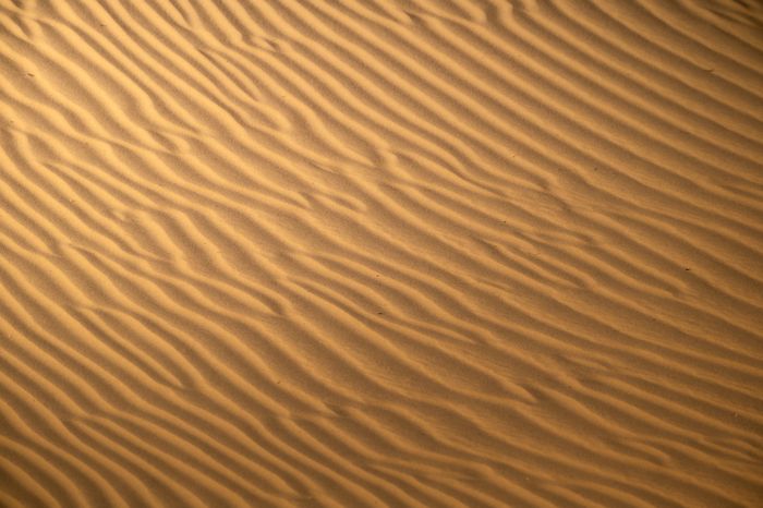 Wind-rippled sand — Zetong Li on Pexels