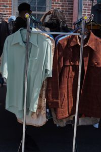 Second-hand shirts hanging on a market rail — Anastasiya Badun on Pexels