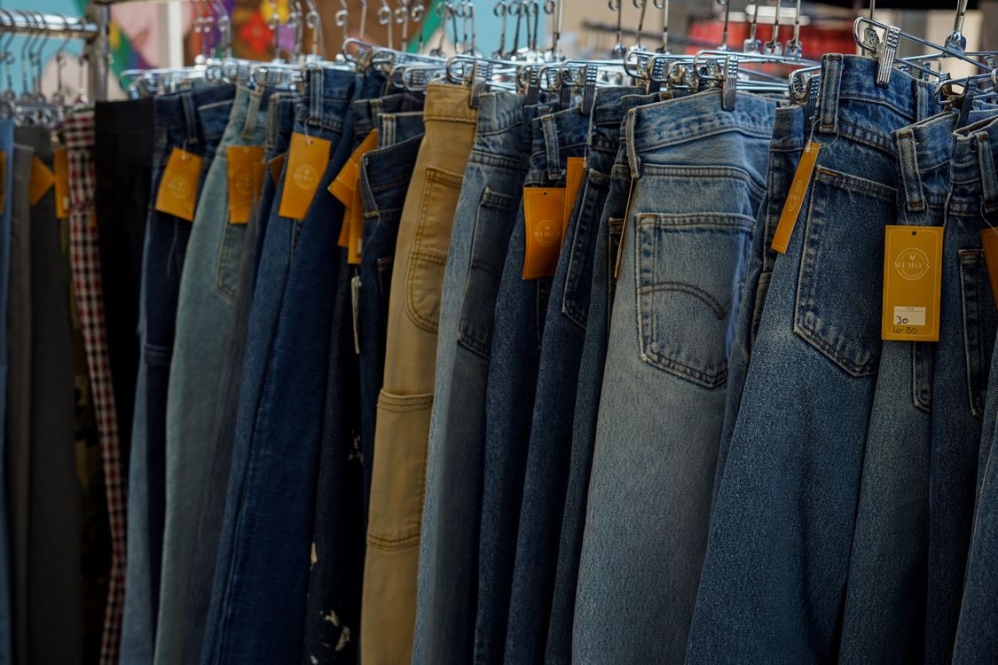 Pants Store Pants Handing in a Clothing Store · Free Stock Photo