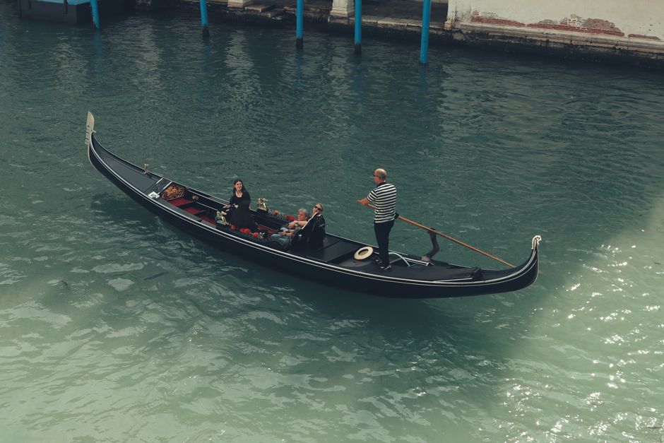 A traditional gondola ride through the canals of Venice, Italy