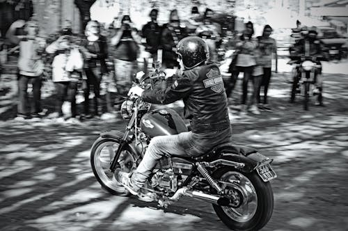 A Biker on a Street in Black and White