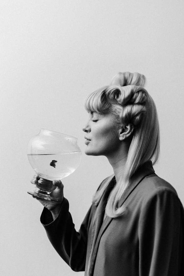 Woman Holding Bowl With Water